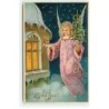 n°21784 - God Jul - Ange gardien apportant un sapin décoré, et faisant sonnant une clochette près d'une maison
