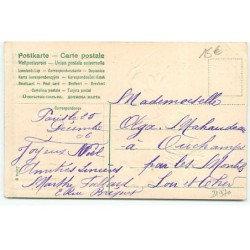 n°21970 - Carte Gaufrée - Heureux Noël - Père Noël apportant un sapin, et se cachant près d'une maison