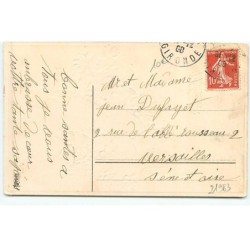 n°21983 - Carte Gaufrée - Bonne Année - Garçon portant des bottes de sept lieues, lançant des violettes