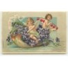n°22130 - Carte Gaufrée - Ange et cupidon dans une barque remplie de violettes