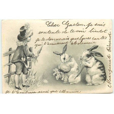 n°22730 - Carte Gaufrée - Clapsaddle - Garçon donnant à manger à des lapins