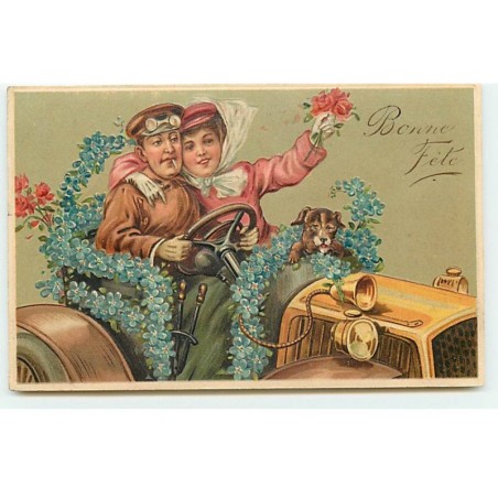 n°22732 - Carte Gaufrée - Bonne Fête - Couple avec un chien au volant d'une voiture, décorée de myosotis