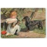 n°23098 - Chiens - Teckel regardant une fillette nourrissant son chiot avec un biberon - dackel