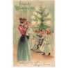 n°23542 - Noël - Fröhliche Weihnachten - Une femme et ses enfants découvrant les jouets près du sapin