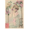 n°24209 - Illustrateur - Jeune femme assise sous des rosiers