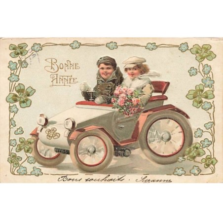 n°24982 - Carte Gaufrée - Bonne Année - Couple dans une voiture