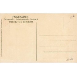 n°25068 - Bonne Année - Fillette ramassant des friandises tombant de la corne d'abondance d'une nacelle de ballon