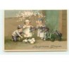 n°11933 - Carte Gaufrée - Heureuses Pâques - Enfants ramassant des oeufs