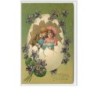 n°3040 - Carte Gaufrée - Joyeuses Pâques - Couple d'enfants dans un oeuf - fleurs violettes