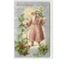 n°882 - Carte Gaufrée - Christmas Greetings - Père Noël avec un sapin sur fond argent