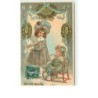 n°12581 - Carte Gaufrée - Bonne Année - Fillettes, l'une tirant l'autre assise sur une chaise