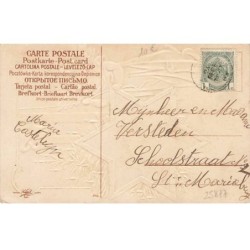 n°25877 - Carte Gaufrée - Noël - Clapsaddle - Ange sonnant une cloche au-dessus d'une femme et son bébé