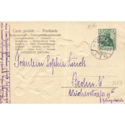 n°27137 - Carte Gaufrée - Prosit Neujahr - Facteur à califourchon sur une bouteille de champagne