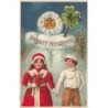 n°27414 - Carte Gaufrée - Prosit Neujahr - Pendule humanisée au-dessus d'un jeune couple