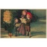 n°27524 - Carte Gaufrée - Noël - Fröhliche Weihnachten - Enfants chantant devant une maison illuminée