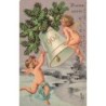 n°27577 - Carte Gaufrée - Bonne Année 1904 - Anges sonnant une cloche au-dessus d'un village