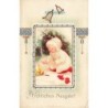 n°27733 - Carte Gaufrée - Clapsaddle - Fröhliches Neujahr -Enfant se réchauffant près d'un feu