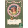 n°27827 - Carte Gaufrée - Bonne Année - Ange lançant des pièces et tenant un panier de trèfles