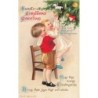 n°28227 - Carte Gaufrée - Clapsaddle - Hearty Christmas Greetings - Enfants, l'un attrapant un jouet dans un sapin