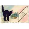 n°28451 - Fantaisie - Chat noir en feutrine, portant un panier rempli de myosothis