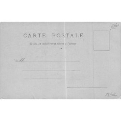 n°28502 - Fantaisie - Femme avec une guitare dans le dos, regardant une lune humanisée  cachée  derrière les nuages