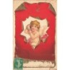 n°28591 - Carte Gaufrée - Clapsaddle - Ange au milieu d'un papier déchiré