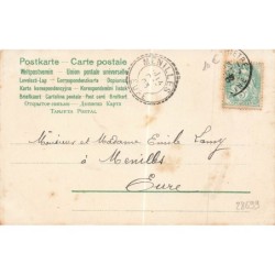 n°28699 - Fantaisie - Clapsaddle - Jeune femme de dos tenant un bouquet de fleurs - Fond rouge