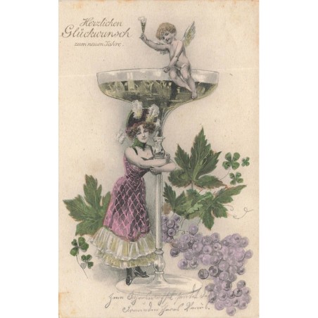 n°29130 - Nouvel An - Angelot assissur le bord d'une  Coupe de champagne entourée de raisin