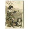 n°13584 - Carte Gaufrée - Chien à côté d'un enfant écrivant sur une ardoise