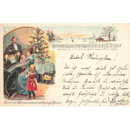 n°29325 - Noël - Une famille chantant près d'un sapin - Partition