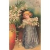 n°29393 - Fantaisie - Clapsaddle - Jeune fille mettant des fleurs dans un grand vase