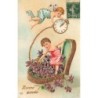 n°29674 - Carte Gaufrée - Bonne Année - Anges, l'un tenant une montre, l'autre au milieu de violettes