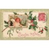 n°30458 - Carte Gaufrée - Clapsaddle - Bonne Année - Ange dans un cadre entouré de gui et de houx