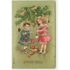 n°14379 - Carte Gaufrée - Joyeux Noël - Fillettes décorant un sapin