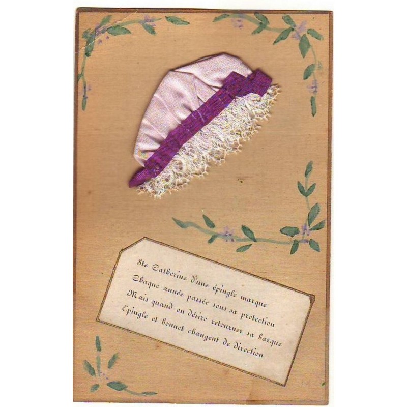 n°14859 - Sainte Catherine d'une épingle marque ... - Bonnet en tissu rose pâle et ruban violet, et bord en dentelle