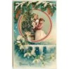 n°15490 - Carte Gaufrée - Heureux Noël - Jeune femme aidant une fillette à décorée un sapin