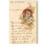 n°15850 - Profil d'une jeune femme dans un médaillon parmi des fleurs