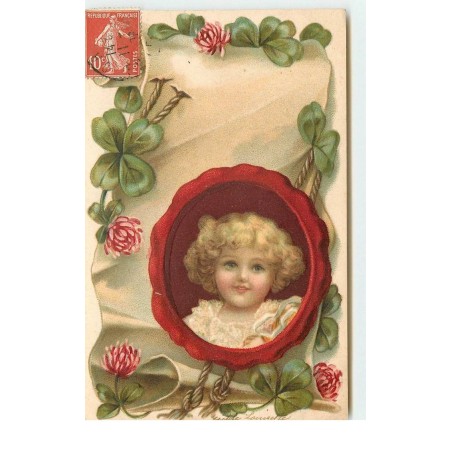n°16149 - Carte Gaufrée - Clapsaddle - Portrait d'une enfant dans un médaillon avec autour des trèfles
