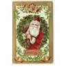 n°16734 - Carte Gaufrée - Good Luck - Père Noël portant un sac au milieu d'une couronne de houx
