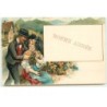 n°17297 - Carte Gaufrée - Bonne Année - Couple d'Alsaciens, homme offrant des fleurs à une jeune femme