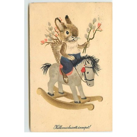 n°17644 - Kellemeshusvétiünnepet - Petit lapin sur un cheval à bascule