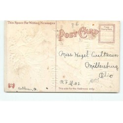 n°18124 - Carte Gaufrée et à paillettes - A Merry Christmas - Père Noël au-dessus d'un mur