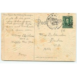 n°18125 - Carte Gaufrée avec paillettes - Merry Christmas - Père Noël poussant un traîneau chargé de paquets