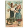 n°18273 - Carte Gaufrée - Bonne et Heureuse Année - Fillette près d'une bouteille de champagne avec des ailes de moulin