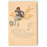 n°18661 - Giris - Jeune femme assise sur un avion