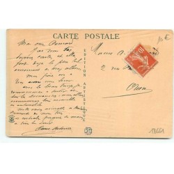 n°18661 - Giris - Jeune femme assise sur un avion