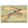 n°19242 - Carte Gaufrée - Bien à vous - Garçon dans un avion lançant des violettes