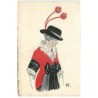 n°19314 - K. - Femme portant un manteau avec un noeud en ruban noir sur le devant