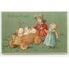 n°19937 - Carte Gaufrée - Glückliches Neujahr - Enfants poussant des cochons dans un chariot