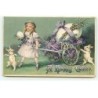 n°20380- Carte Gaufrée - A Happy Easter - Fillette tirant un oeuf dans une brouette remplie de violettes